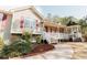Inviting exterior featuring a covered porch, gazebo, and manicured landscaping at 31 Wyngate Ct, Dallas, GA 30157