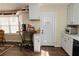 Cozy kitchenette with small table, coffee station, and counter space for easy meal prep at 31 Wyngate Ct, Dallas, GA 30157