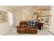 Comfortable living room features plush seating and a view of the staircase at 31 Wyngate Ct, Dallas, GA 30157