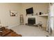 Living room featuring a fireplace with mantel, modern decor, and neutral-colored walls at 31 Wyngate Ct, Dallas, GA 30157