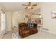 Spacious living room with plush seating, staircase access, and neutral carpeting at 31 Wyngate Ct, Dallas, GA 30157