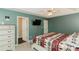 Main bedroom with a unique ceiling, decorative furniture, and a TV on the wall at 31 Wyngate Ct, Dallas, GA 30157