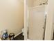 Compact bathroom with a glass-doored shower and neutral-toned walls at 31 Wyngate Ct, Dallas, GA 30157