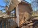 Close up exterior shot of house showing siding, windows, and black shutters at 3116 Lake Monroe Rd, Douglasville, GA 30135