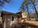 Exterior of home showing siding, windows, and access door at 3116 Lake Monroe Rd, Douglasville, GA 30135