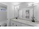 Bathroom showcasing double sinks, granite counters, and modern fixtures at 4275 Azalea Walk, Ellenwood, GA 30294