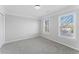 Bedroom boasts plush carpet, natural light and offers space for customization at 4275 Azalea Walk, Ellenwood, GA 30294