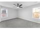Large bedroom with a ceiling fan and ample natural light at 4275 Azalea Walk, Ellenwood, GA 30294