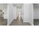 Bright hallway with new floors, fresh paint, and elegant trim details throughout the home at 4275 Azalea Walk, Ellenwood, GA 30294