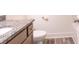 Bathroom featuring granite countertop with a sink, toilet, and bathtub at 5316 Radford Loop, Fairburn, GA 30213
