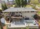 Backyard aerial view featuring a deck, patio, and outdoor seating area for relaxation and entertainment at 2711 Winding Ne Ln, Brookhaven, GA 30319