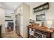 Bright kitchen featuring stainless steel refrigerator and connected breakfast nook at 2711 Winding Ne Ln, Brookhaven, GA 30319