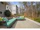 Outdoor patio area with comfortable seating and lush greenery at 2711 Winding Ne Ln, Brookhaven, GA 30319