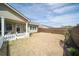 Fenced backyard with lawn, patio and view of the back of the house at 2917 Knob Creek Dr, Snellville, GA 30078