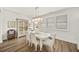 Bright dining area with ample natural light, hardwood floors, and stylish furnishings at 2917 Knob Creek Dr, Snellville, GA 30078