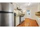 Traditional style kitchen with stainless steel appliances, granite countertops, and tile floors at 6105 Queen Anne Ct, Norcross, GA 30093