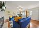 Bright living room with a fireplace, hardwood floors, and contemporary decor for a welcoming atmosphere at 6105 Queen Anne Ct, Norcross, GA 30093