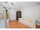 Bedroom featuring a twin sized bed with a wardrobe and a door to the outside patio at 31 Greenland Trce, Atlanta, GA 30342