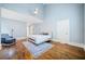 Spacious bedroom with hardwood floors, a ceiling fan, and light blue walls at 31 Greenland Trce, Atlanta, GA 30342