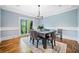 Chic dining room with hardwood floors and stylish chandelier at 31 Greenland Trce, Atlanta, GA 30342