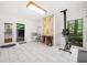 Bright home gym with fireplace, tiled floors, and natural light at 31 Greenland Trce, Atlanta, GA 30342