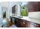 Kitchen showcases granite counters, stainless appliances, and a picturesque window view at 31 Greenland Trce, Atlanta, GA 30342