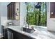Kitchen features granite countertops, stainless steel appliances, and a bright window at 31 Greenland Trce, Atlanta, GA 30342