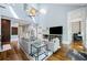 Spacious living room with high ceilings, fireplace, and open layout at 31 Greenland Trce, Atlanta, GA 30342