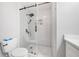 Modern bathroom with glass-enclosed shower, white subway tile, and sleek fixtures, offering a fresh and clean aesthetic at 31 Greenland Trce, Atlanta, GA 30342