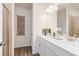 Bathroom with double vanity, white cabinets, and modern fixtures at 315 Skye Ln # 50, Cartersville, GA 30121