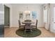 Dining area with three paintings, a modern light fixture, and a door to the outside at 315 Skye Ln # 50, Cartersville, GA 30121