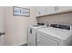 Laundry room with included washer and dryer, and upper cabinets for storage at 315 Skye Ln # 50, Cartersville, GA 30121