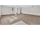 Spacious basement area features carpet flooring, and natural light at 5338 Timor Trl, Lithonia, GA 30038