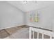 A bedroom with natural light coming in through two windows at 5338 Timor Trl, Lithonia, GA 30038