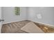 Bedroom with new carpet being installed and natural light at 5338 Timor Trl, Lithonia, GA 30038