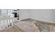 A bedroom next to a kitchen, which is visible through the door at 5338 Timor Trl, Lithonia, GA 30038