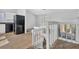 Kitchen and dining area with black fridge and tiled floors at 5338 Timor Trl, Lithonia, GA 30038