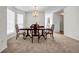 Inviting dining area with chandelier and large window, perfect for Gathering meals and gatherings at 114 Belmonte Sw Dr, Atlanta, GA 30311