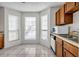 Bright kitchen featuring lots of natural light and ample countertop space for cooking prep at 114 Belmonte Sw Dr, Atlanta, GA 30311