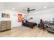 Teen's bedroom features cool decor, fun wall art, a bed, desk area, and unique flooring at 770 Winding Creek Trl, Dacula, GA 30019