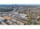 Aerial view featuring commercial and residential areas against a backdrop of the city skyline at 1261 Lavista Ne Rd # B3, Atlanta, GA 30324