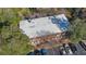 Birds-eye view showing the building, surrounded by mature trees and adjacent to a parking lot at 1261 Lavista Ne Rd # B3, Atlanta, GA 30324