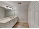 Simple bathroom featuring white vanity, ample counter space, and modern lighting at 50 Senator Lake Dr, Douglasville, GA 30134