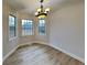 Bright dining room with a chandelier and large windows at 50 Senator Lake Dr, Douglasville, GA 30134