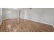 Spacious basement featuring wood-look floors and bright, neutral paint at 2664 Homeland Dr, Atlanta, GA 30360