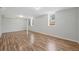 Spacious basement featuring wood-look floors and bright, neutral paint at 2664 Homeland Dr, Atlanta, GA 30360
