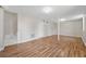 Spacious basement featuring wood-look floors and bright, neutral paint at 2664 Homeland Dr, Atlanta, GA 30360