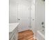 Bathroom with white vanity and a shower over tub combination at 2664 Homeland Dr, Atlanta, GA 30360