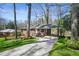 Charming brick home featuring a carport and well-maintained front yard at 2664 Homeland Dr, Atlanta, GA 30360