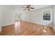 Bright living room featuring hardwood floors, a ceiling fan, and lots of natural light at 2664 Homeland Dr, Atlanta, GA 30360